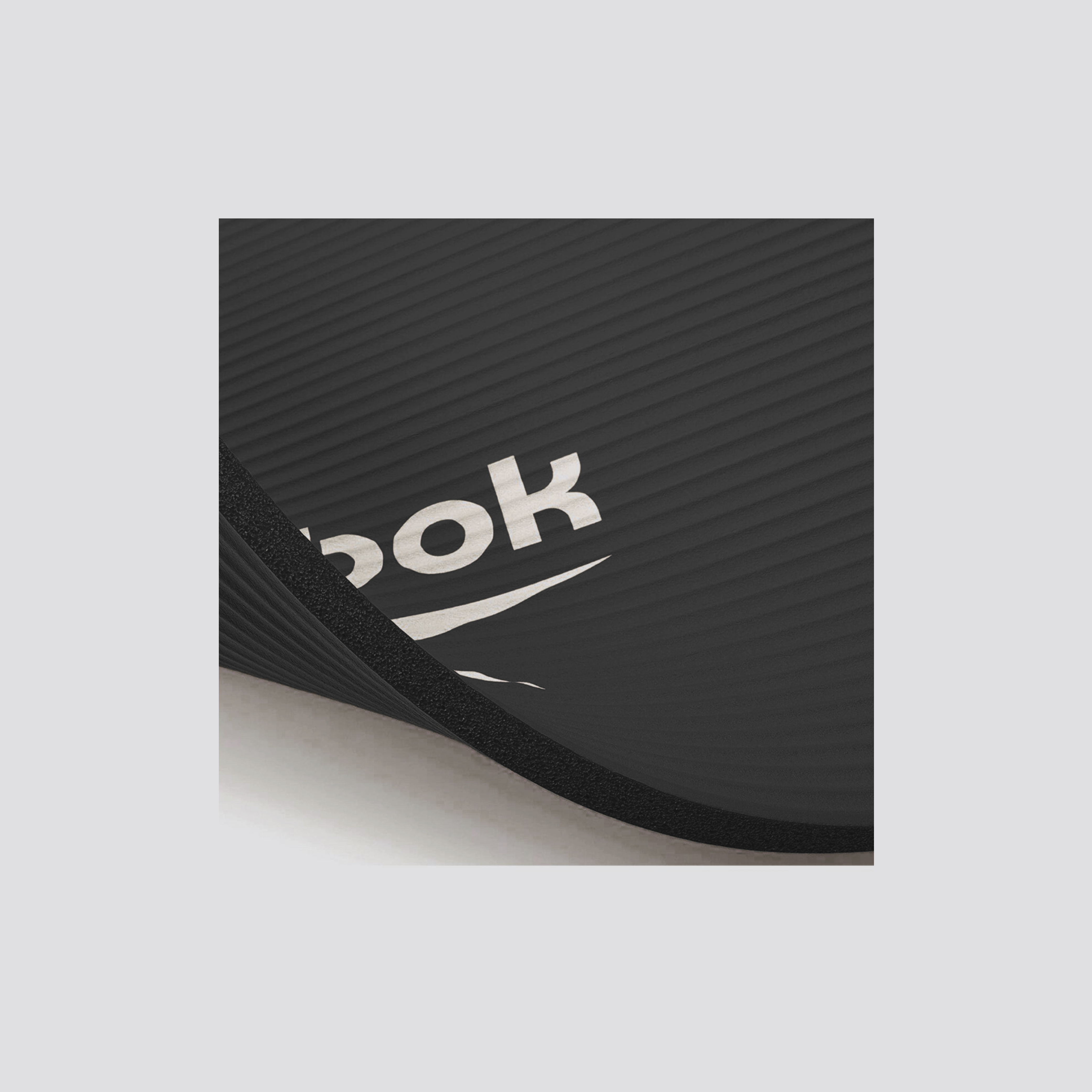 Colchoneta NBR · Reebok · 10 mm · Negro / Rojo