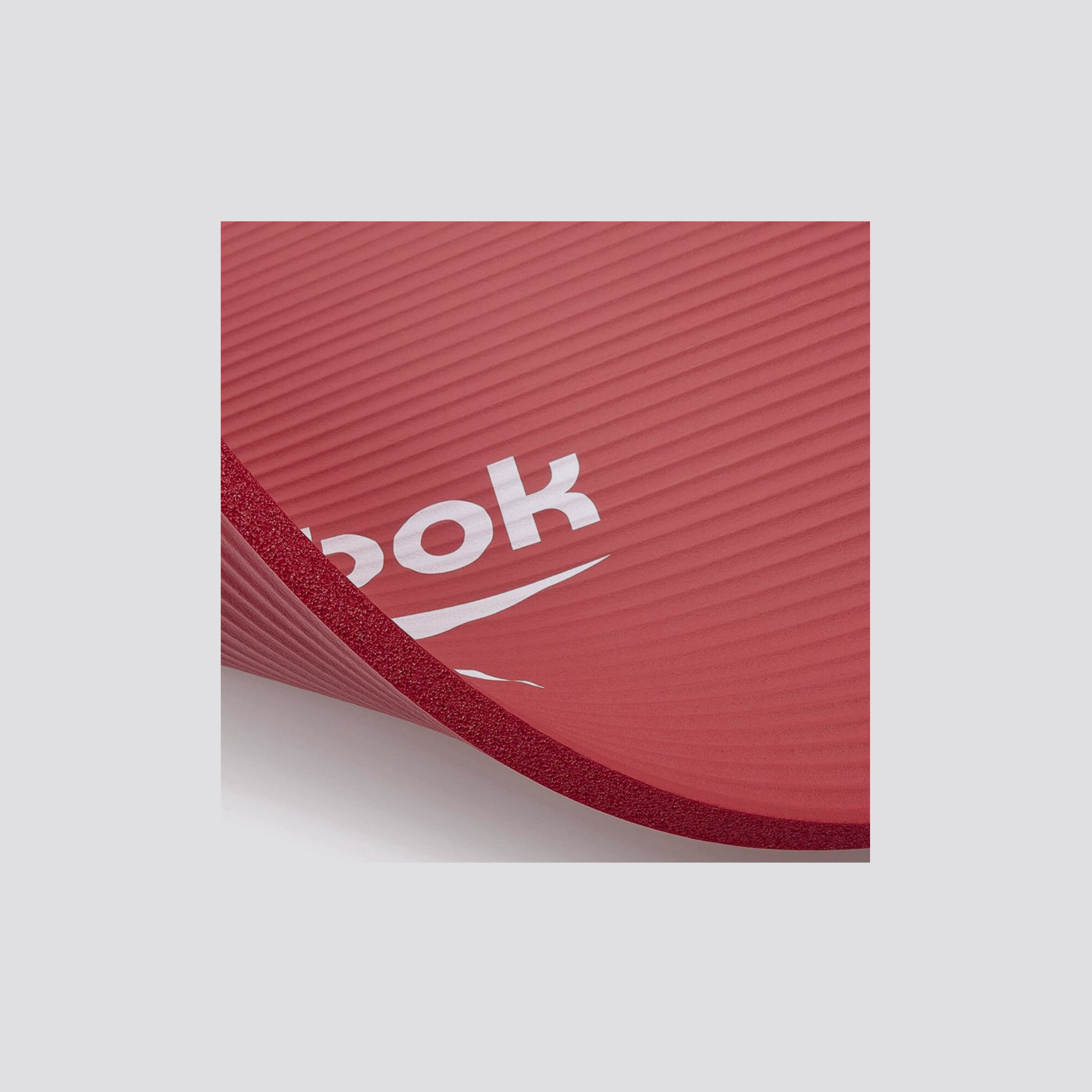 Colchoneta NBR · Reebok · 10 mm · Negro / Rojo